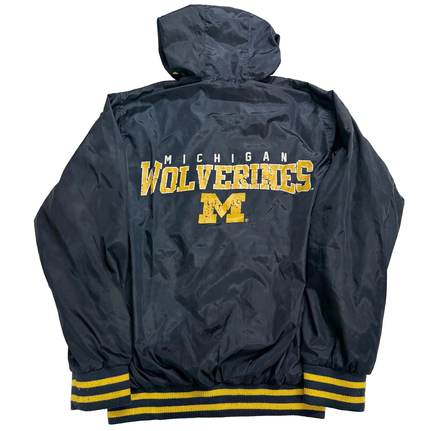 Navy blue jacket with 'Michigan Wolverines' text and logo on a white background