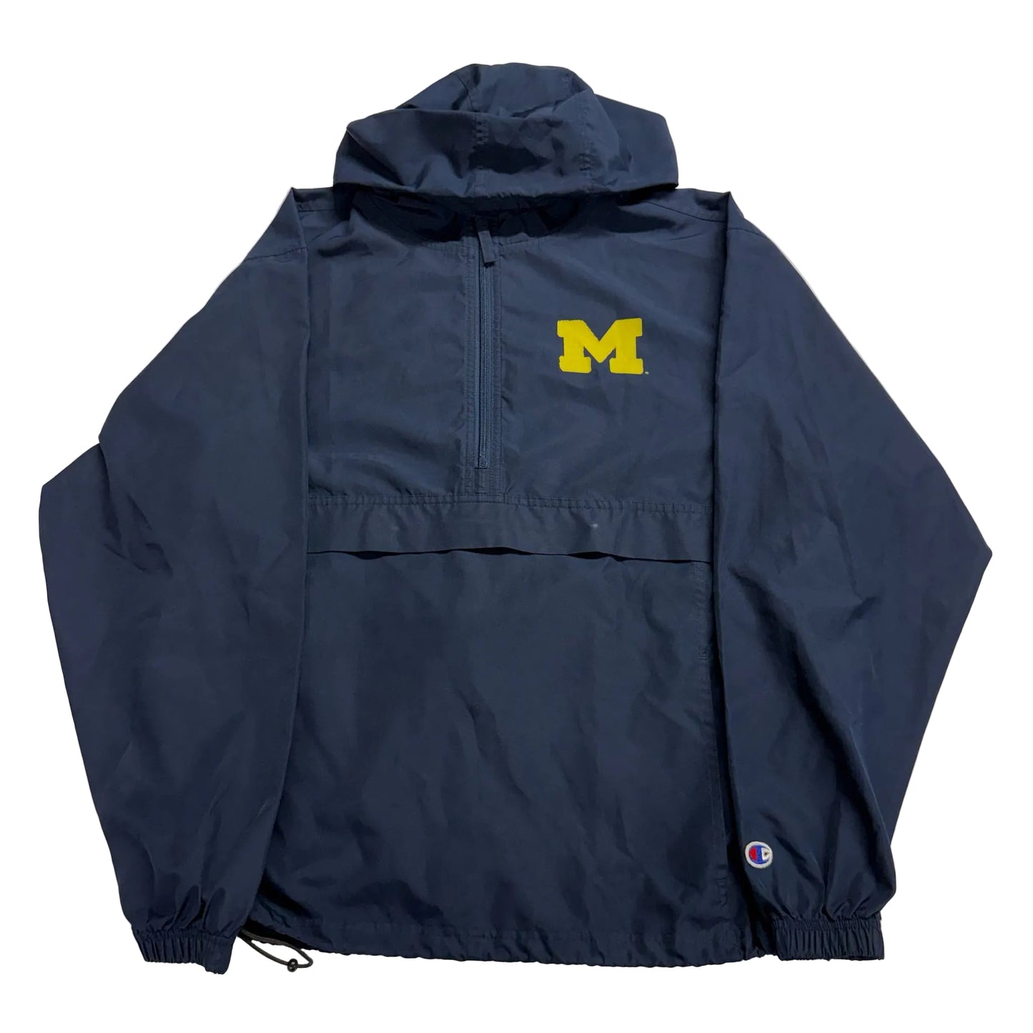 Navy blue jacket with yellow logo on a light gray background