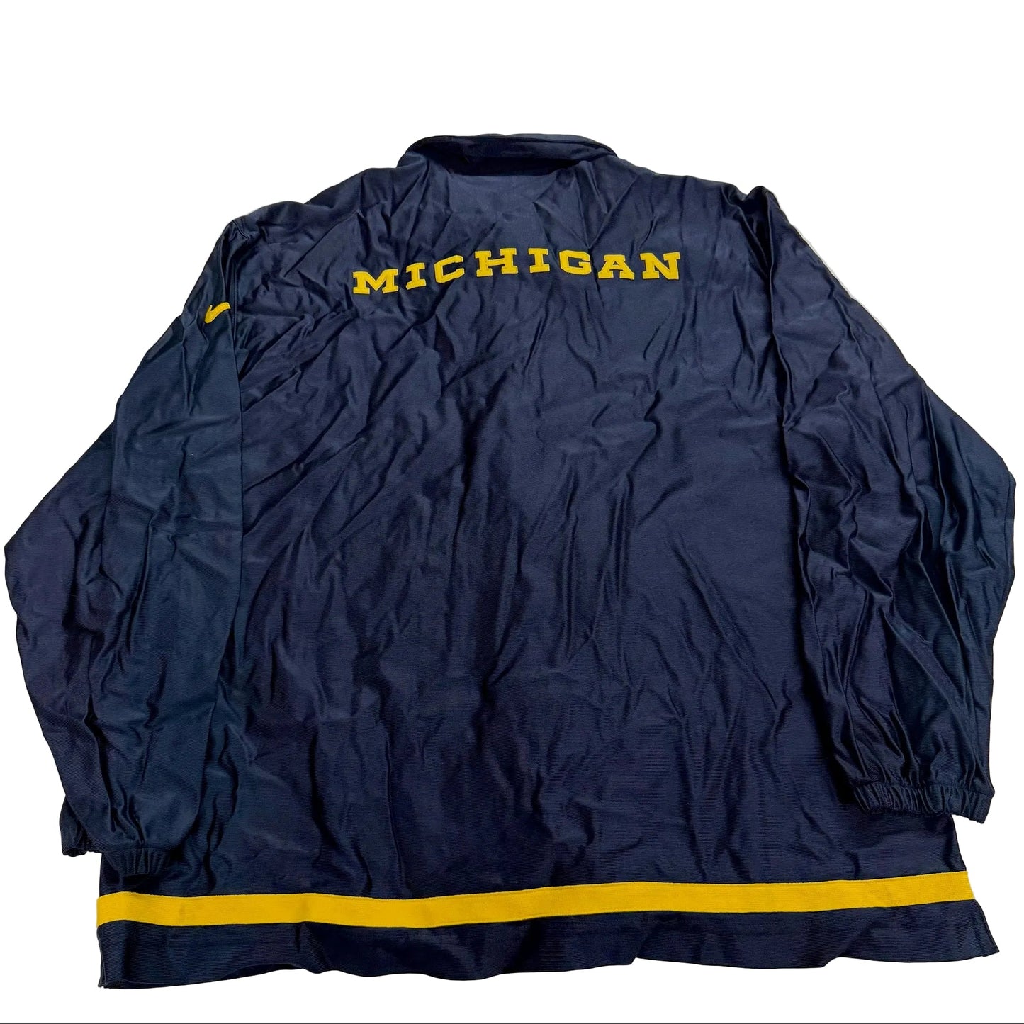Navy blue jacket with 'MICHIGAN' text on a light gray background