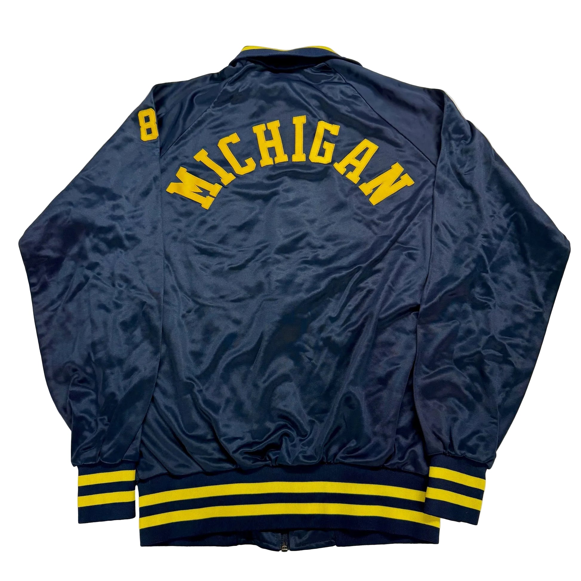 Blue jacket with 'Michigan' printed on the back against a white background