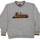 University of Michigan gray crewneck sweatshirt featuring 'Michigan Wolverines' embroidered on the chest in black and gold, with beige and navy ribbed trim on the collar, cuffs, and hem.