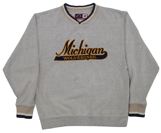 University of Michigan gray crewneck sweatshirt featuring 'Michigan Wolverines' embroidered on the chest in black and gold, with beige and navy ribbed trim on the collar, cuffs, and hem.