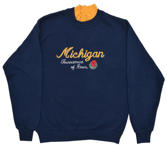 University of Michigan navy blue crewneck sweatshirt with a yellow mock neck collar, featuring 'Michigan Tournament of Roses' printed in yellow and white on the chest with a rose graphic.