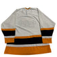 Hockey jersey with orange and black stripes on a white background