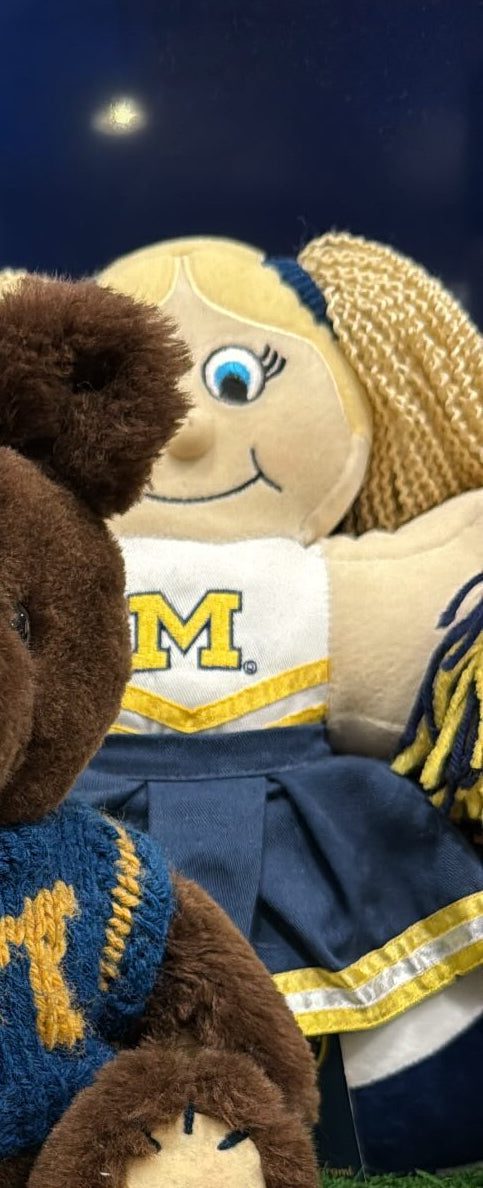Michigan Bear & cheer leader