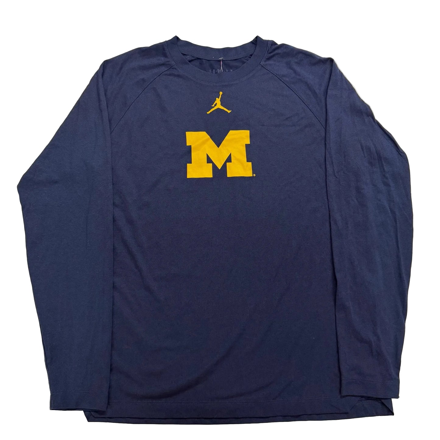 Navy long-sleeve shirt with yellow 'M' logo on a white background