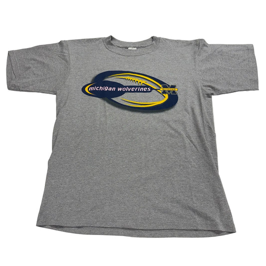 Gray t-shirt with Michigan Wolverines logo on a white background