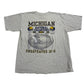 Gray t-shirt with 'Michigan National Champions 1997' text and graphics on a white background