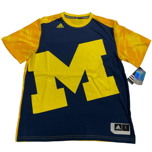 Navy and yellow sports jersey with large 'M' logo on a white background