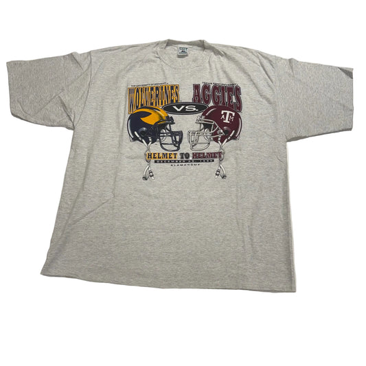 Gray t-shirt with football helmet graphic and text on a white background