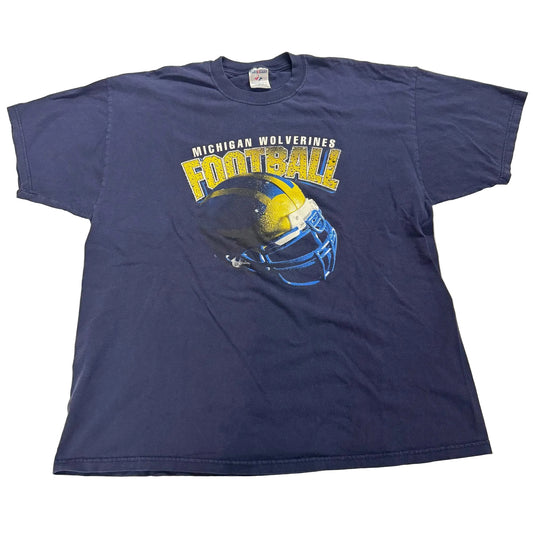 Blue t-shirt with Michigan Wolverines football helmet graphic on a white background