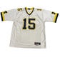 White sports jersey with number 15 and Nike logo on a white background