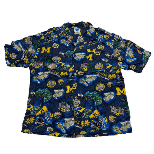 Blue patterned shirt with logos on a white background