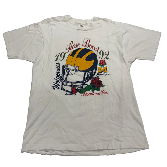 White t-shirt with football helmet graphic and text on a white background