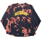 Tie-dye sweatshirt with 'Michigan' text on a white surface
