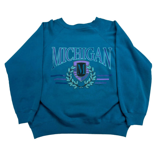 Blue sweatshirt with 'Michigan' and crest design on a white background