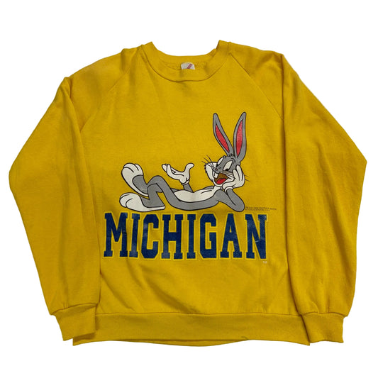 Yellow sweatshirt with Bugs Bunny graphic and 'Michigan' text on a white background
