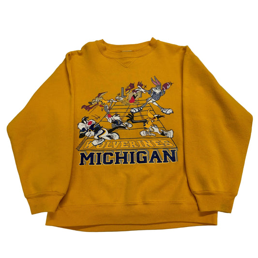 Yellow sweatshirt with cartoon characters and 'Michigan' text on a white background