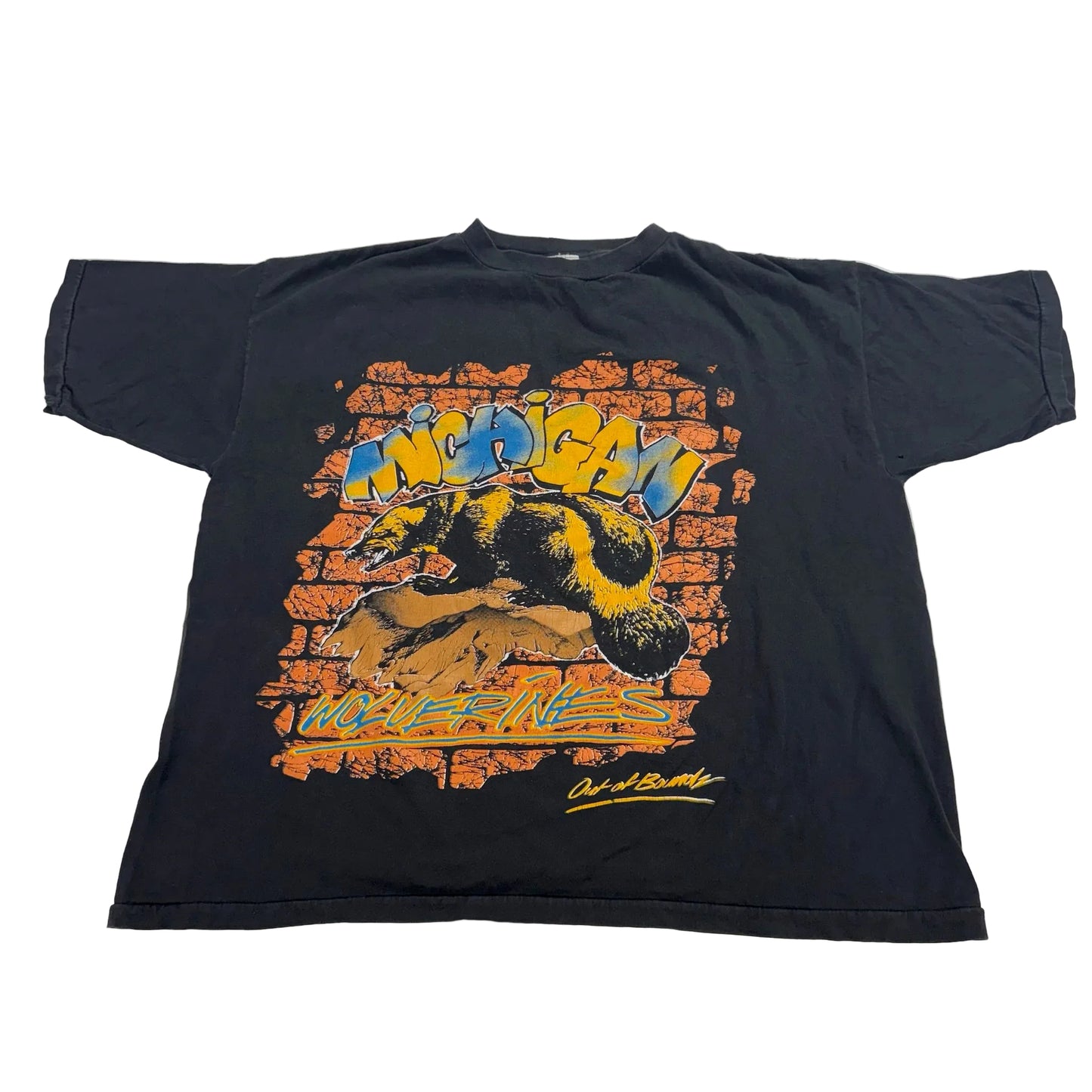 Black t-shirt with colorful graphic design on a white background