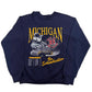 Navy blue sweatshirt with 'Michigan' and a graphic of a hockey player on a white background