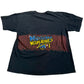 Black t-shirt with 'Michigan Wolverine' graphic on a white surface