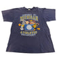 Navy blue t-shirt with cartoon characters and 'Property of Michigan Athletic Department' text on a white background