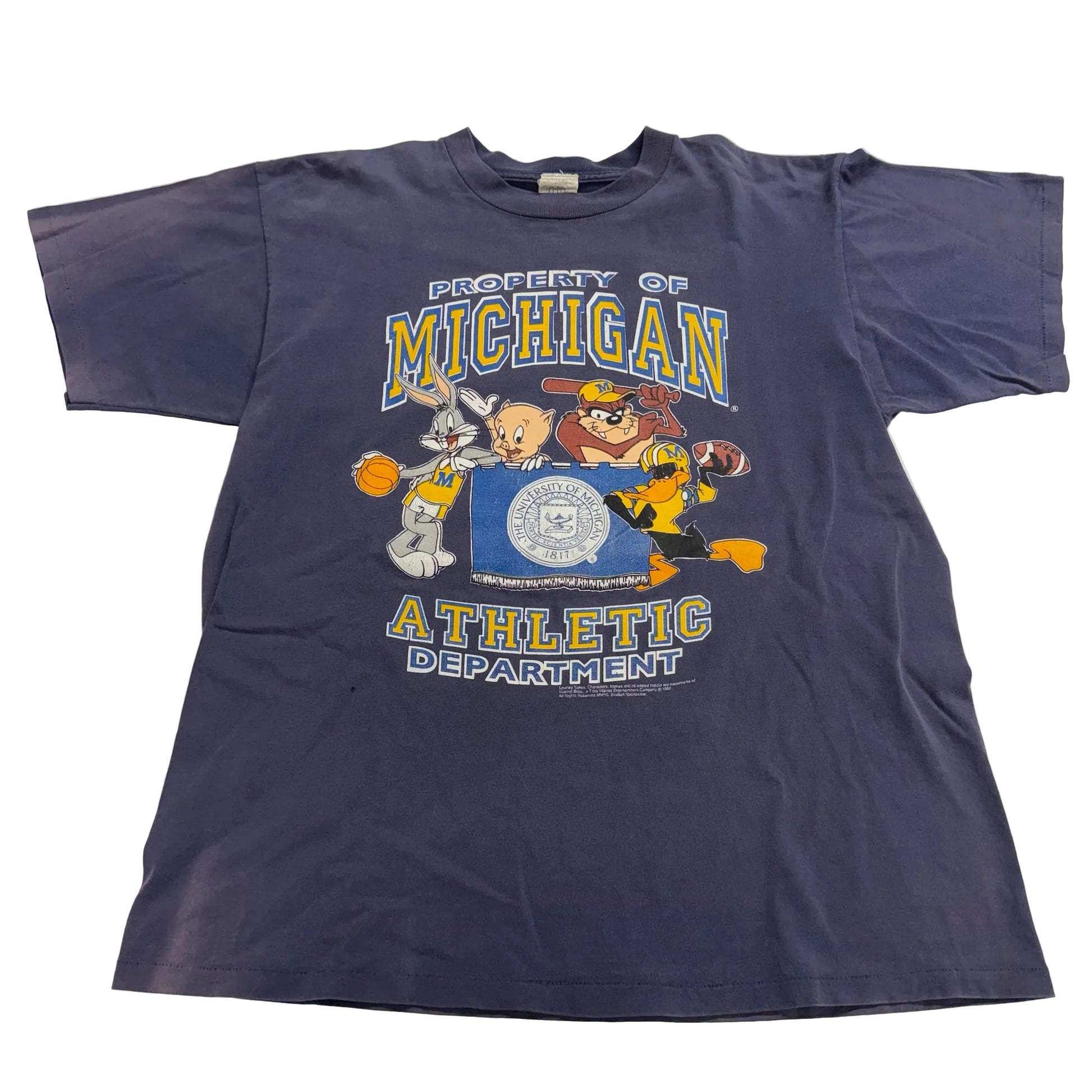 Navy blue t-shirt with cartoon characters and 'Property of Michigan Athletic Department' text on a white background