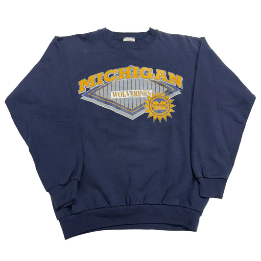 Navy blue sweatshirt with 'Michigan Wolverines' logo on a white background