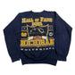 Navy blue sweatshirt with 'Hall of Fame Bowl Michigan Wolverines' print on a white background