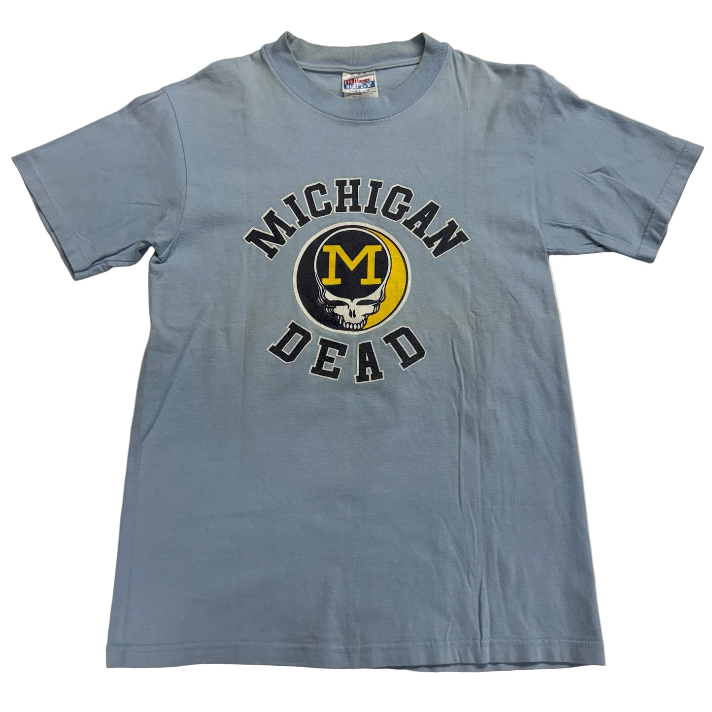 Blue t-shirt with 'Michigan Dead' graphic design on a light gray background