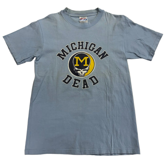 Blue t-shirt with 'Michigan Dead' graphic design on a light gray background