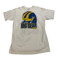 White t-shirt with blue and yellow graphic and 'BIG GEAR' text on a white background