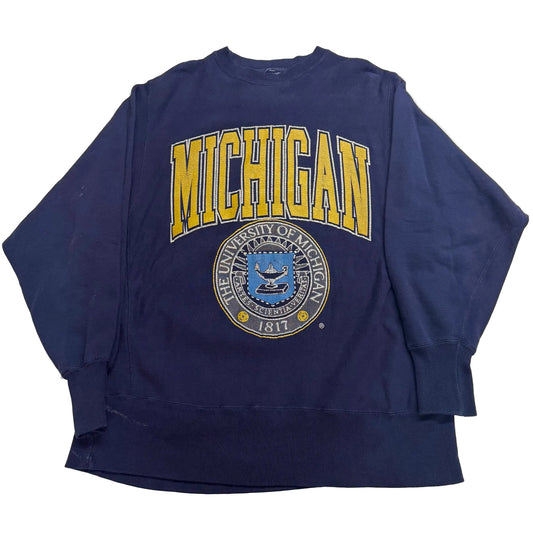 Blue sweatshirt with 'Michigan' text and logo on a white background