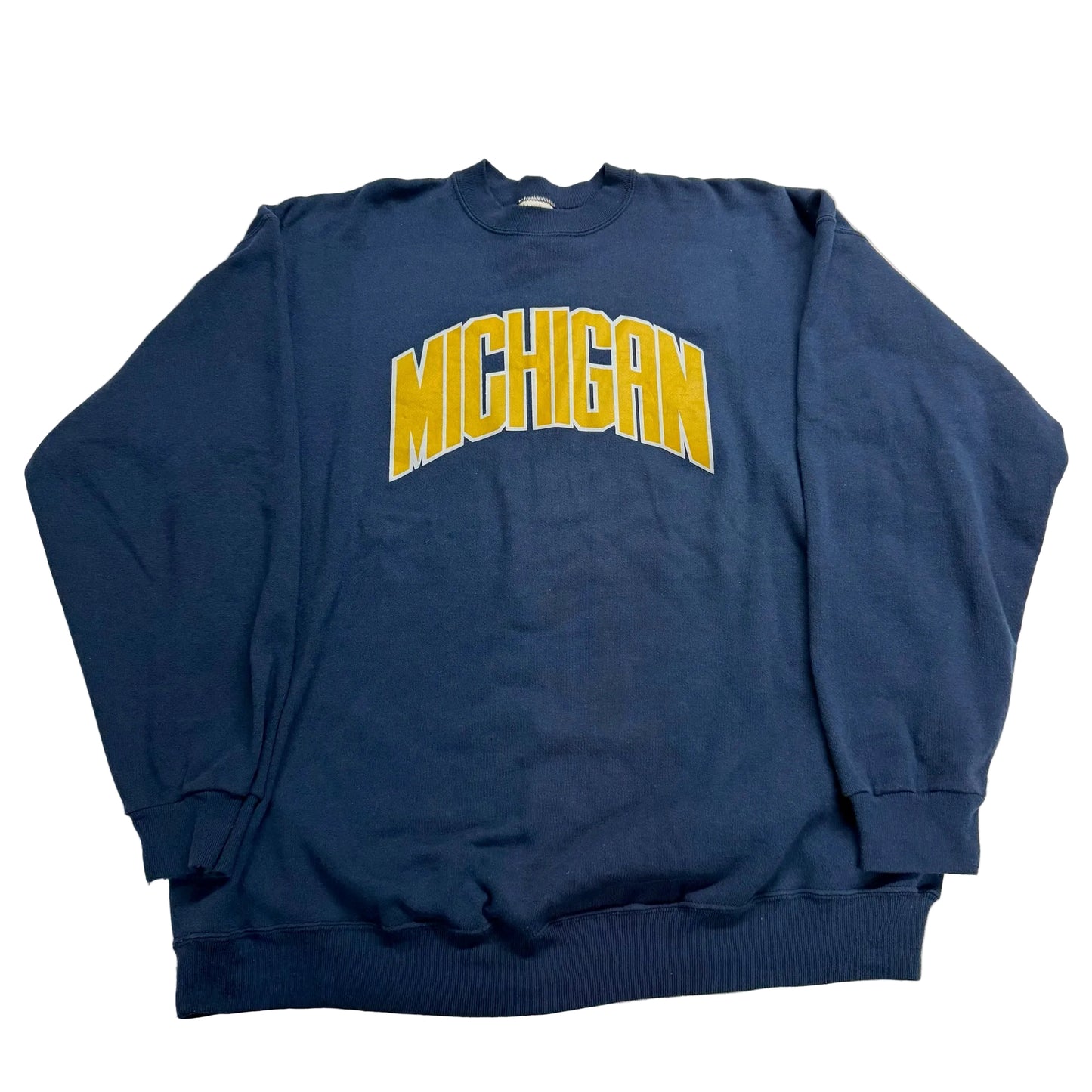 Blue sweatshirt with 'MICHIGAN' printed in yellow on a white surface