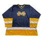Navy blue sports jersey with yellow and white accents, featuring a large 'M' and 'Michigan' text on a white background.
