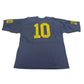 Blue sports jersey with yellow number 10 on a white table