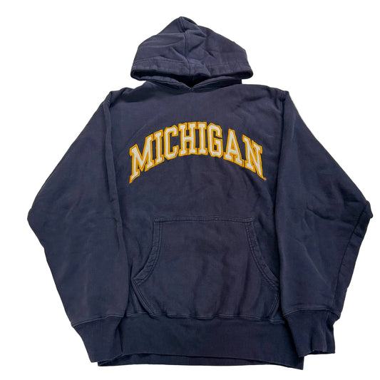 Navy blue hoodie with 'Michigan' printed on the back against a white background