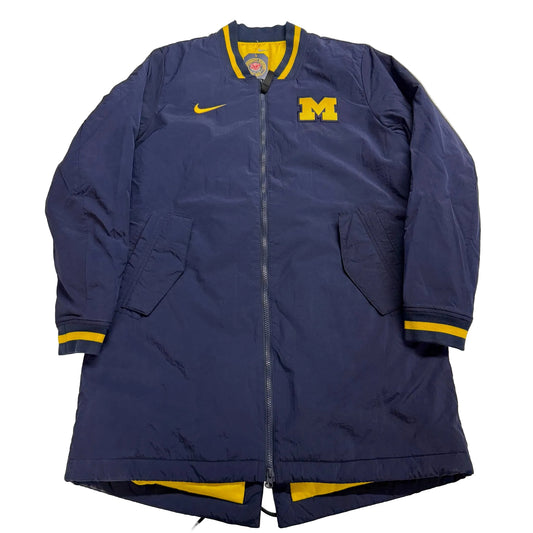 Blue jacket with yellow accents and a logo on a white background