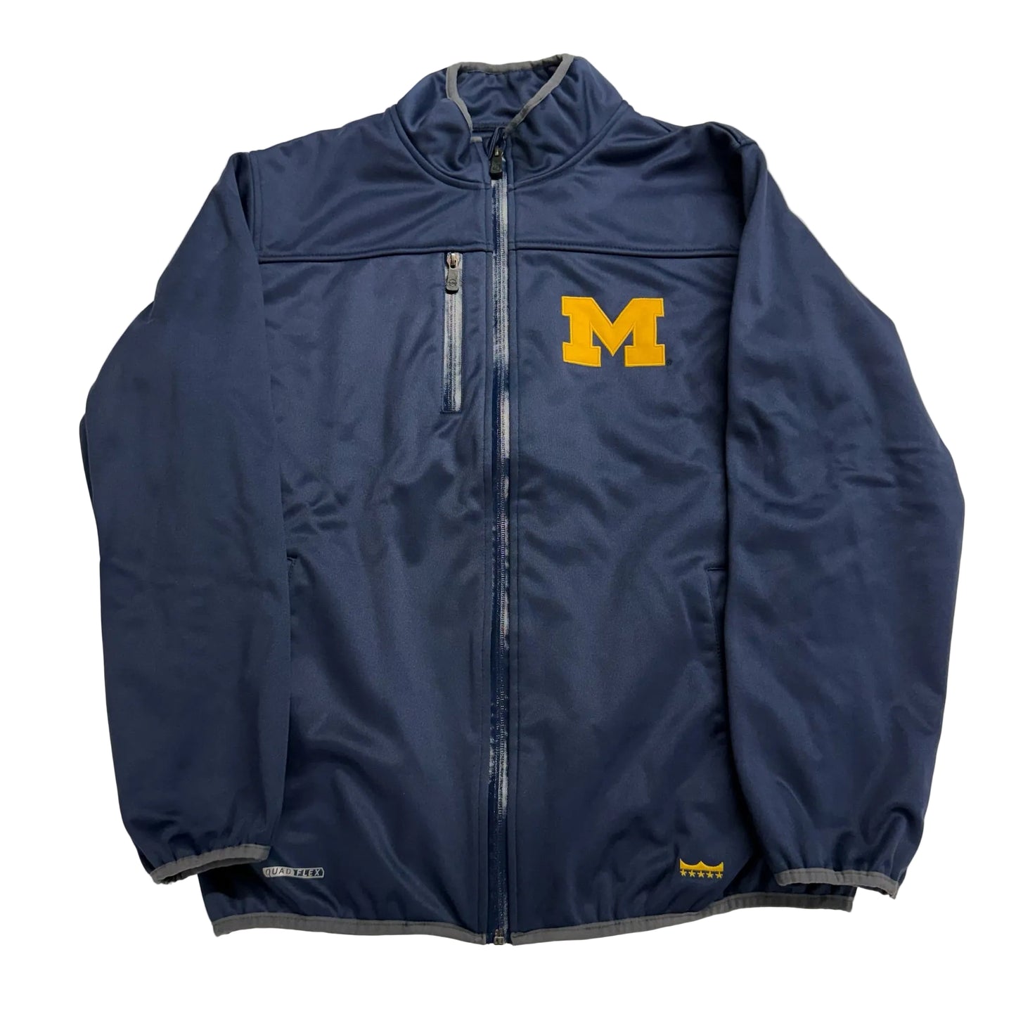 Blue jacket with a yellow 'M' logo on a light gray background