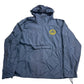 Blue jacket with a logo on a beige background