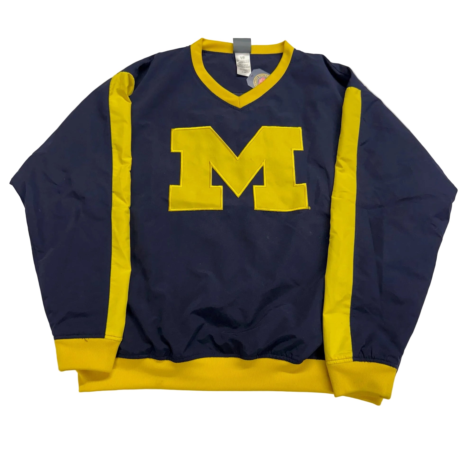Navy blue sweatshirt with yellow trim and a large 'M' on a white background